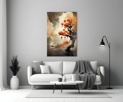 Tree of Hope Glass Art featuring a gnarled black tree with red lanterns and orange foliage displayed above a white sofa in a modern living room.