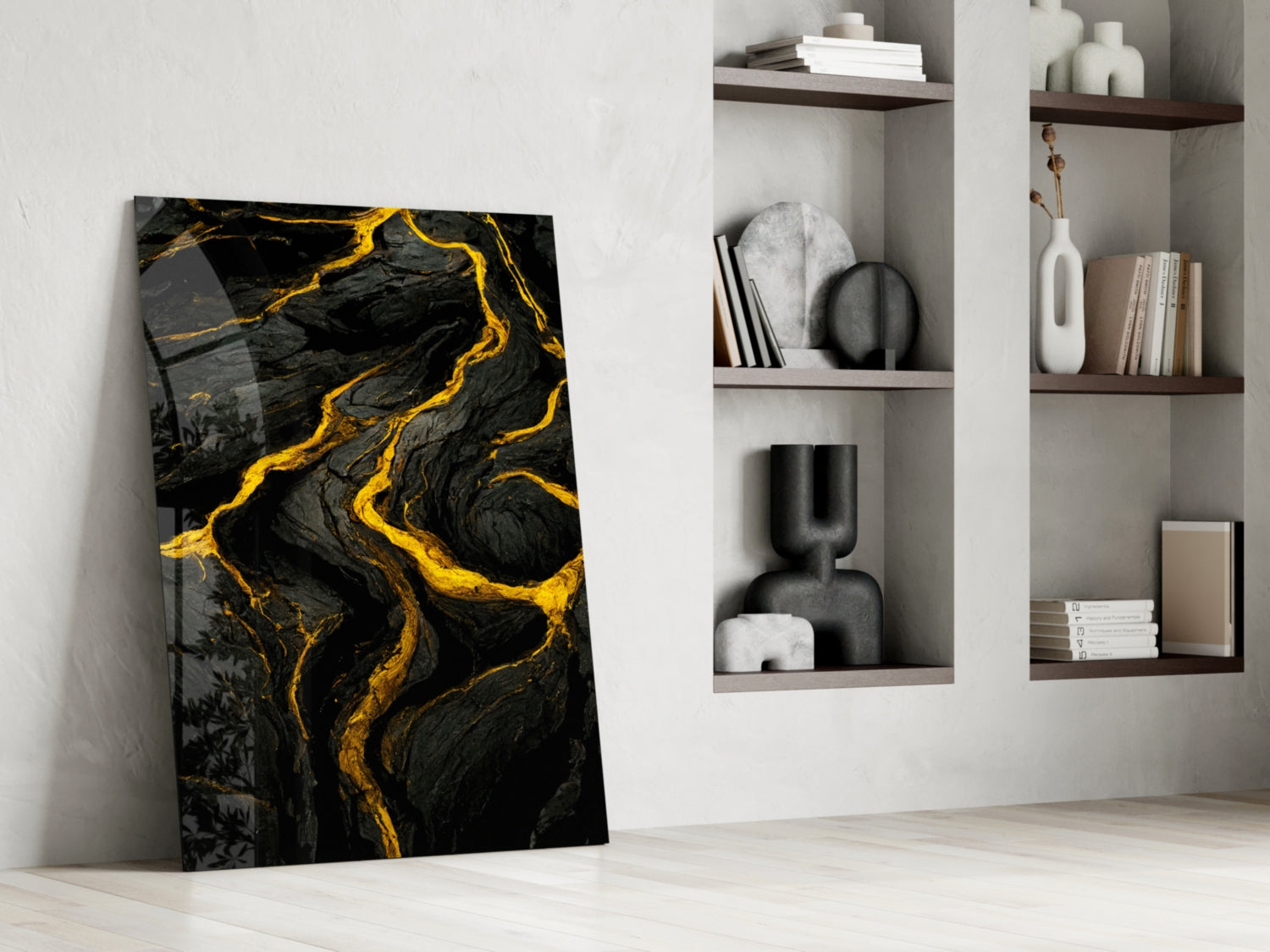 Black and gold marbled slit glass art leaning against white wall beside shelving unit with decorative objects.
