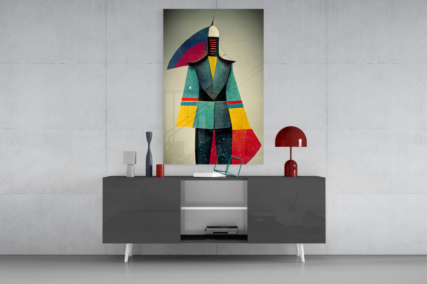 Colorful geometric glass art figure displayed on dark console table with red lamp and decorative objects against white wall.