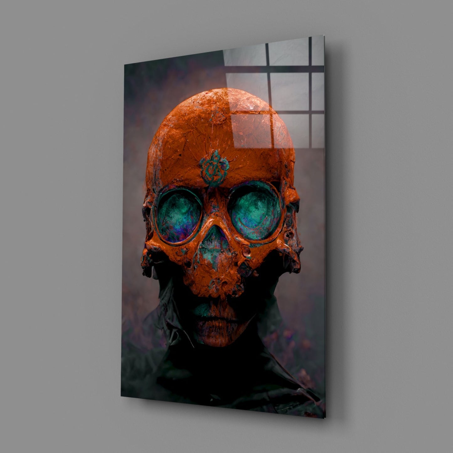 Angled view of glass art panel displaying rust-orange skull with turquoise eye sockets against dark background.