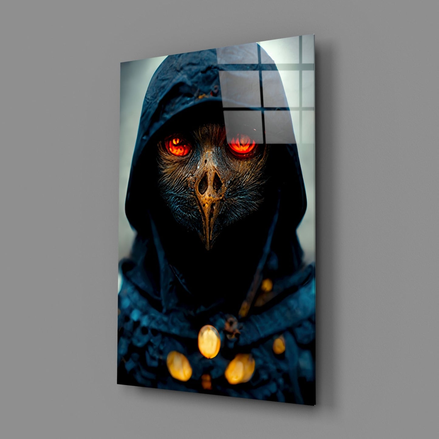 Angled display of glass art panel showing hooded owl figure with glowing red eyes and golden chest ornaments against gray wall background.
