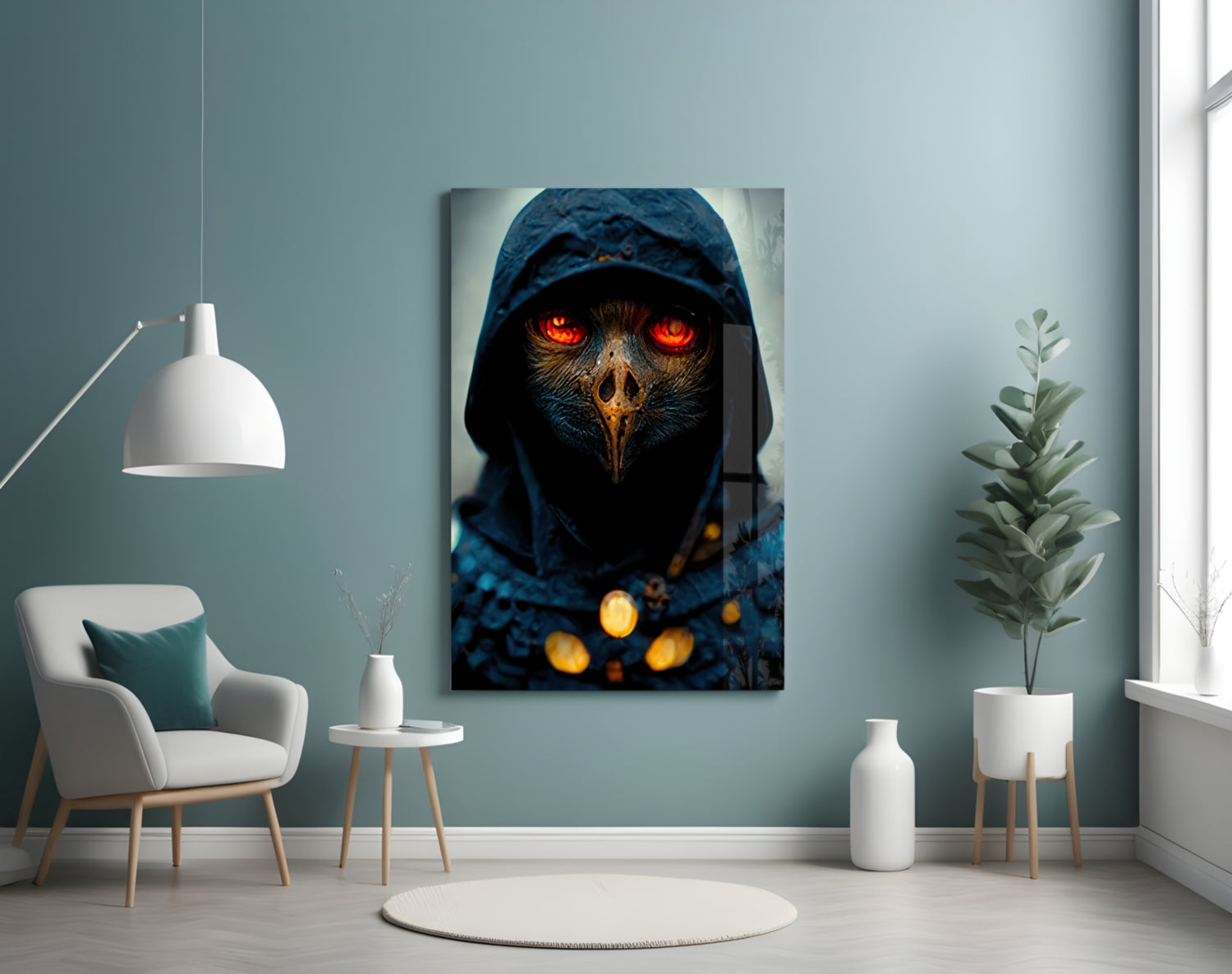 Canvas art depicting a hooded bird figure with glowing orange eyes and chest ornaments against a dark blue background, displayed on a muted teal wall.