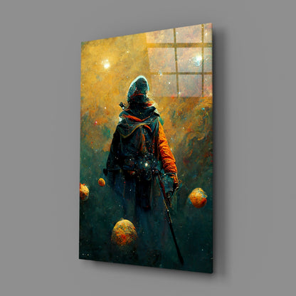 Glass wall art displaying a hooded figure with sword amid floating golden spheres against yellow and teal gradient background.