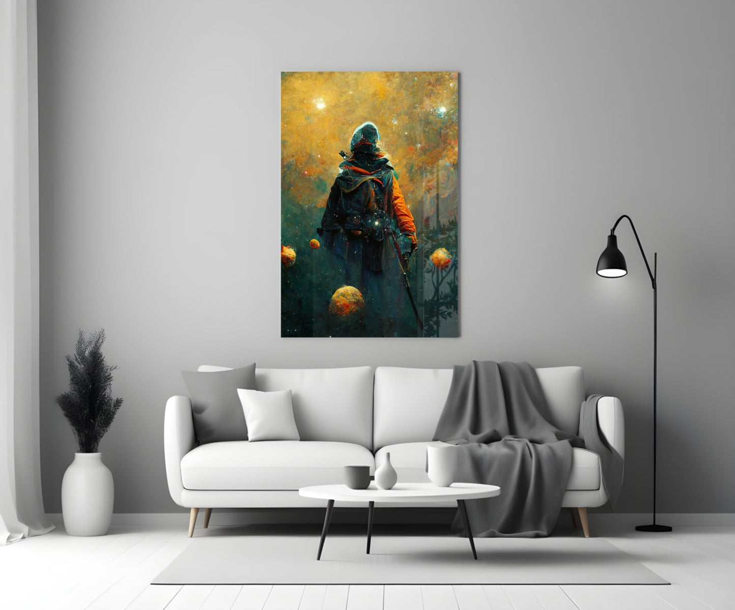 Glass wall art depicting a hooded figure in orange and dark clothing holding a staff, surrounded by glowing golden spheres against a golden-green atmospheric background, displayed above a white sofa in a modern living room.