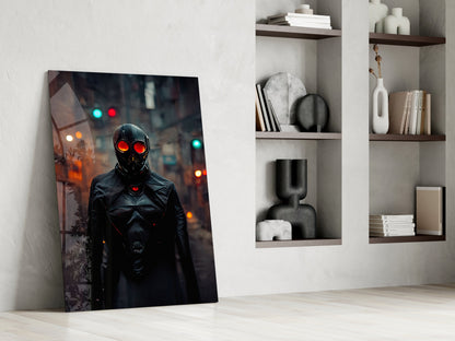 Black Rage glass art leaning against white wall beside shelving unit, featuring figure with glowing red eyes in urban nighttime setting.