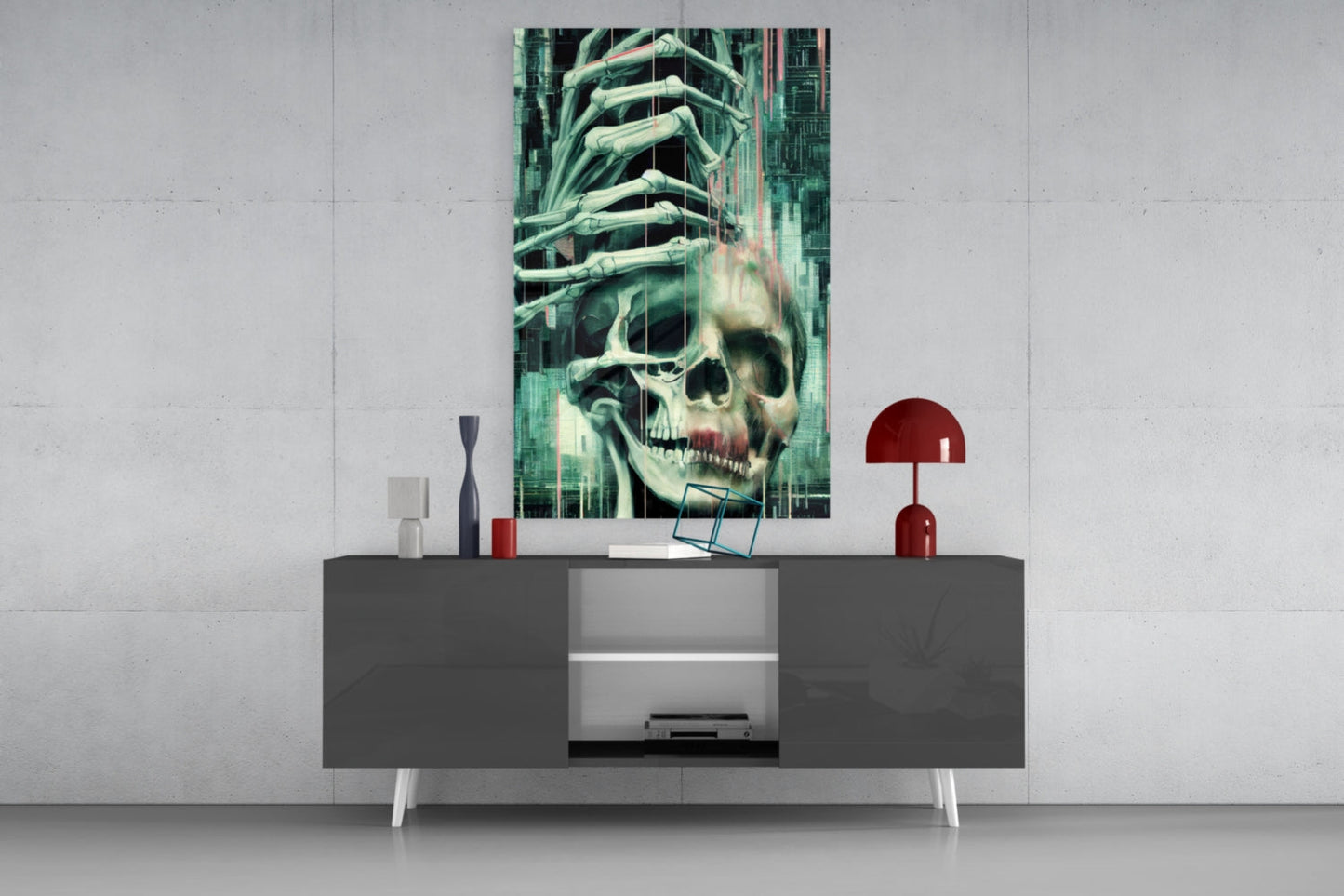 Modern living room display featuring green and cream skull artwork with skeletal hands above a dark gray media console with red and black decorative accessories.