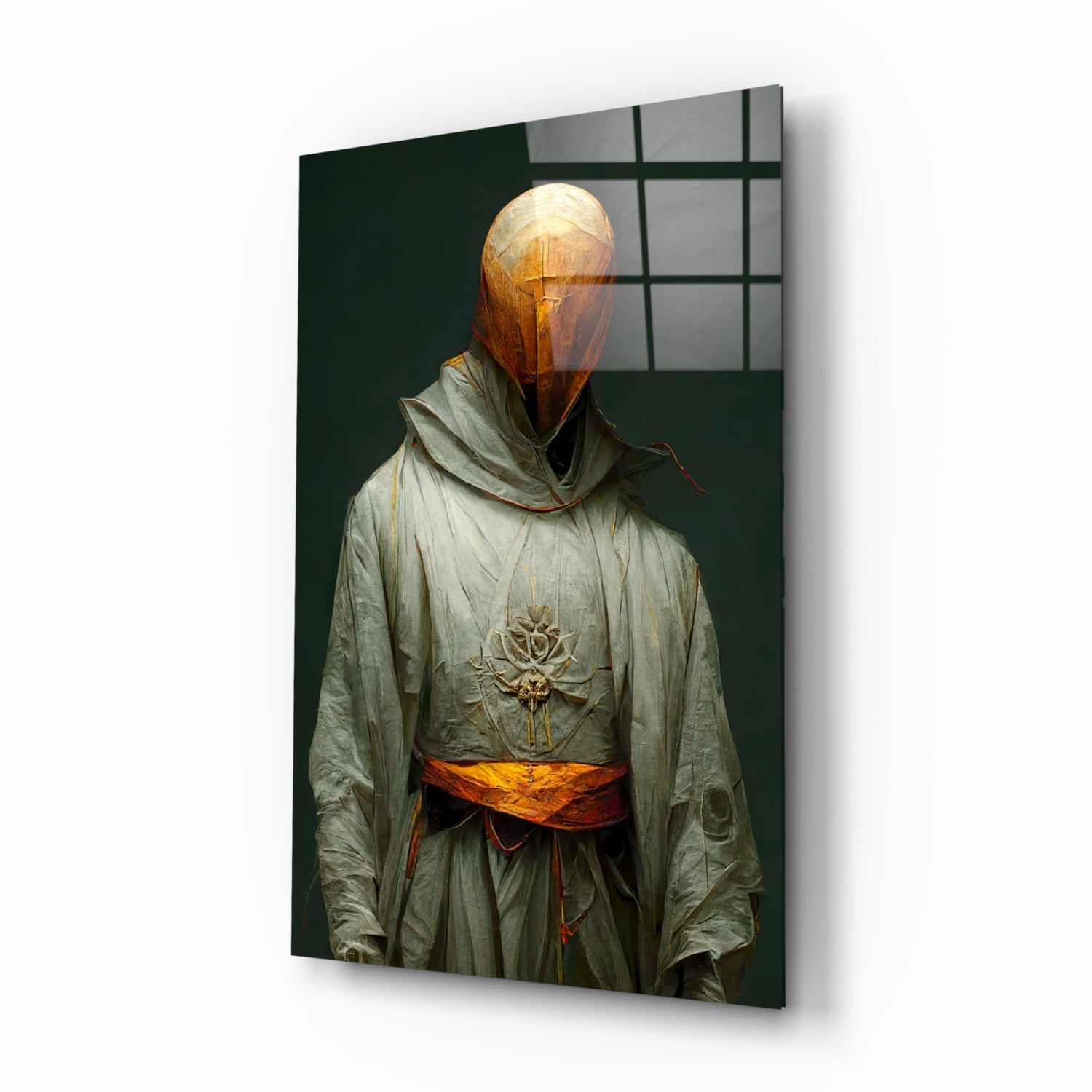 Angled view of glass art panel showing robed figure with glowing amber head, embroidered lotus chest motif, and orange sash against dark green background.