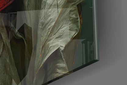 Close-up detail of textured glass surface showing layered gray and white brushstrokes with gold accents on the Headless Monk glass art piece.