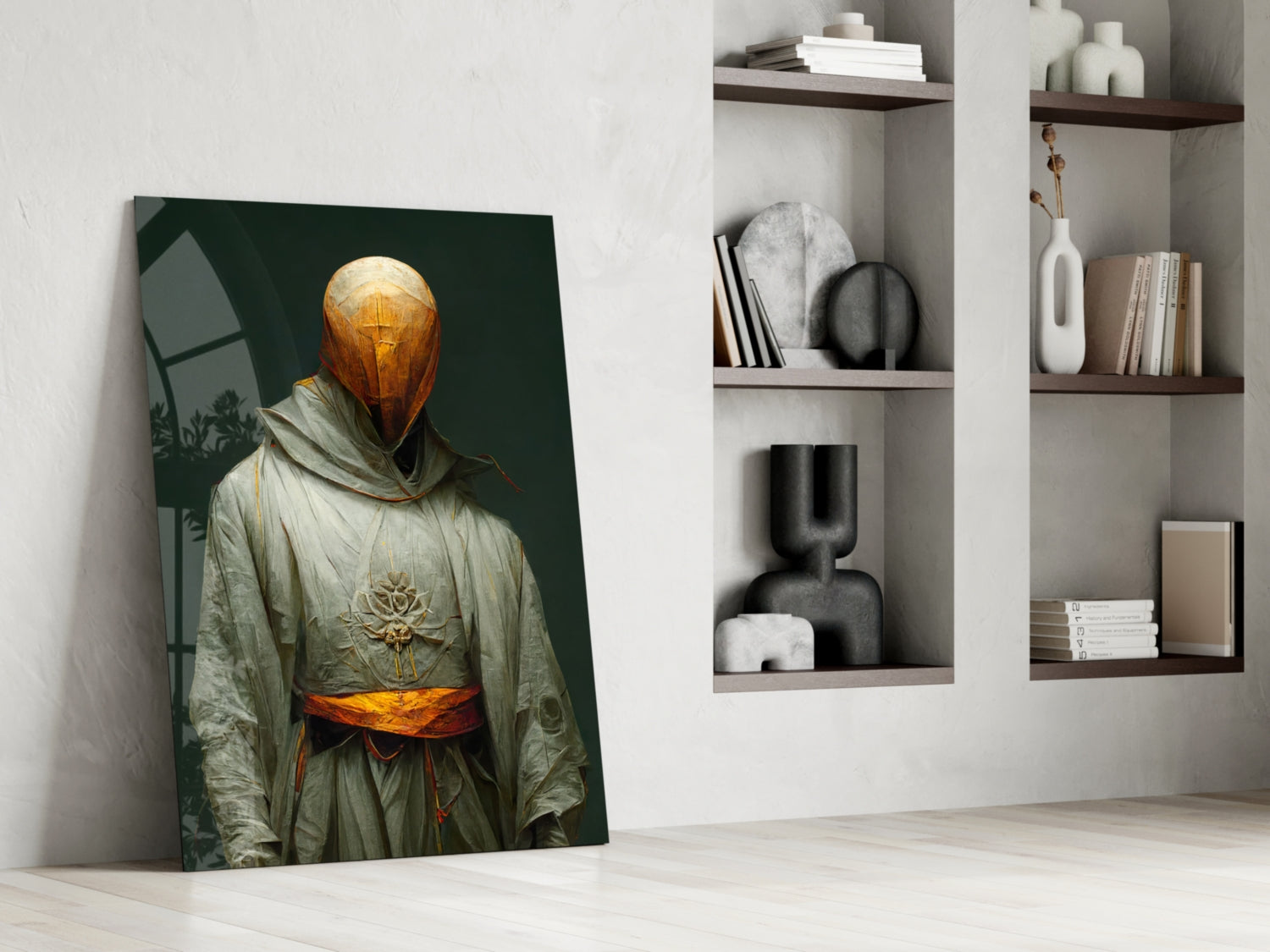 Glass art print leaning against white wall shows robed figure with golden sphere head and orange sash against dark green background.