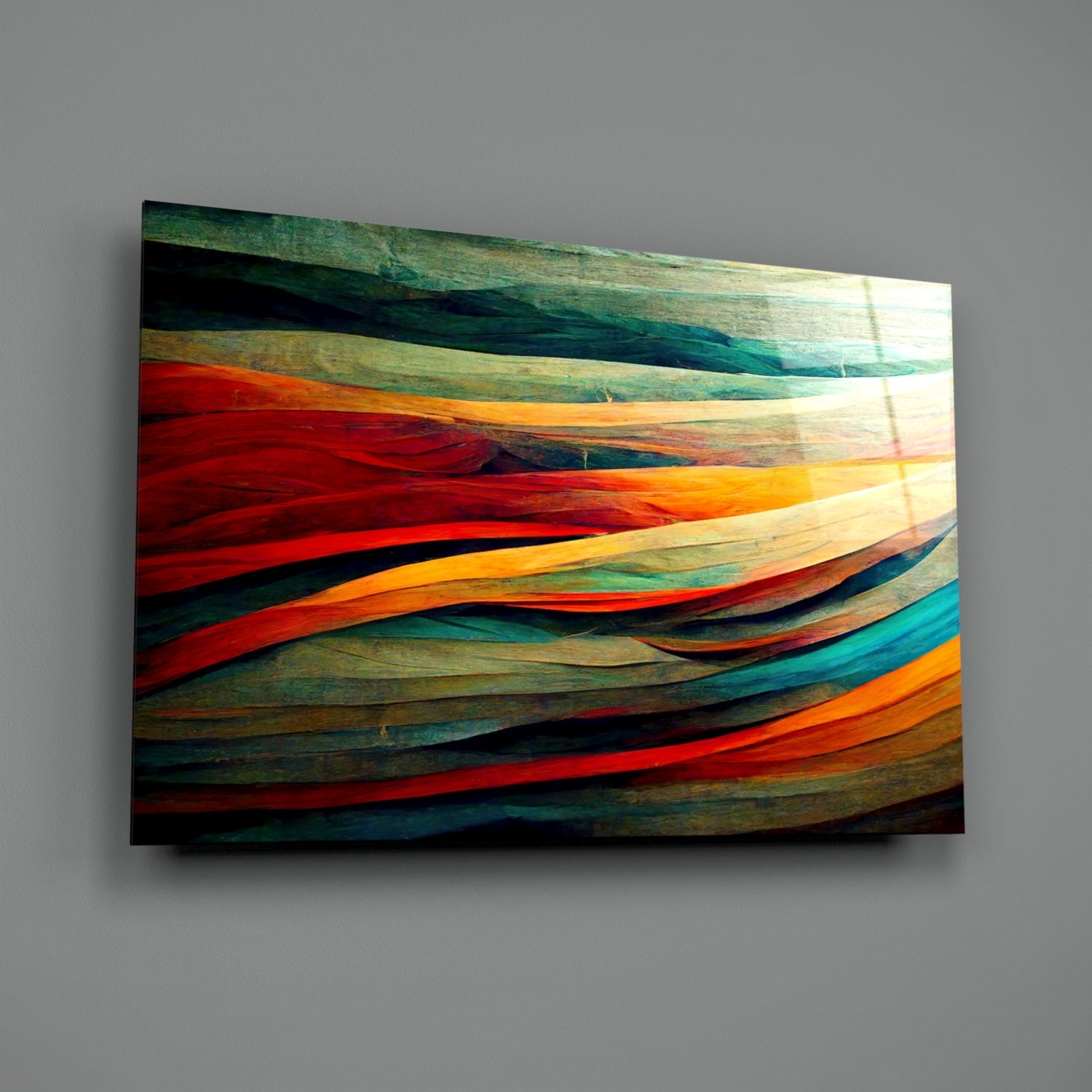 Layered glass art panel displaying horizontal wavy stripes in red, orange, teal, and natural wood tones against gray wall.