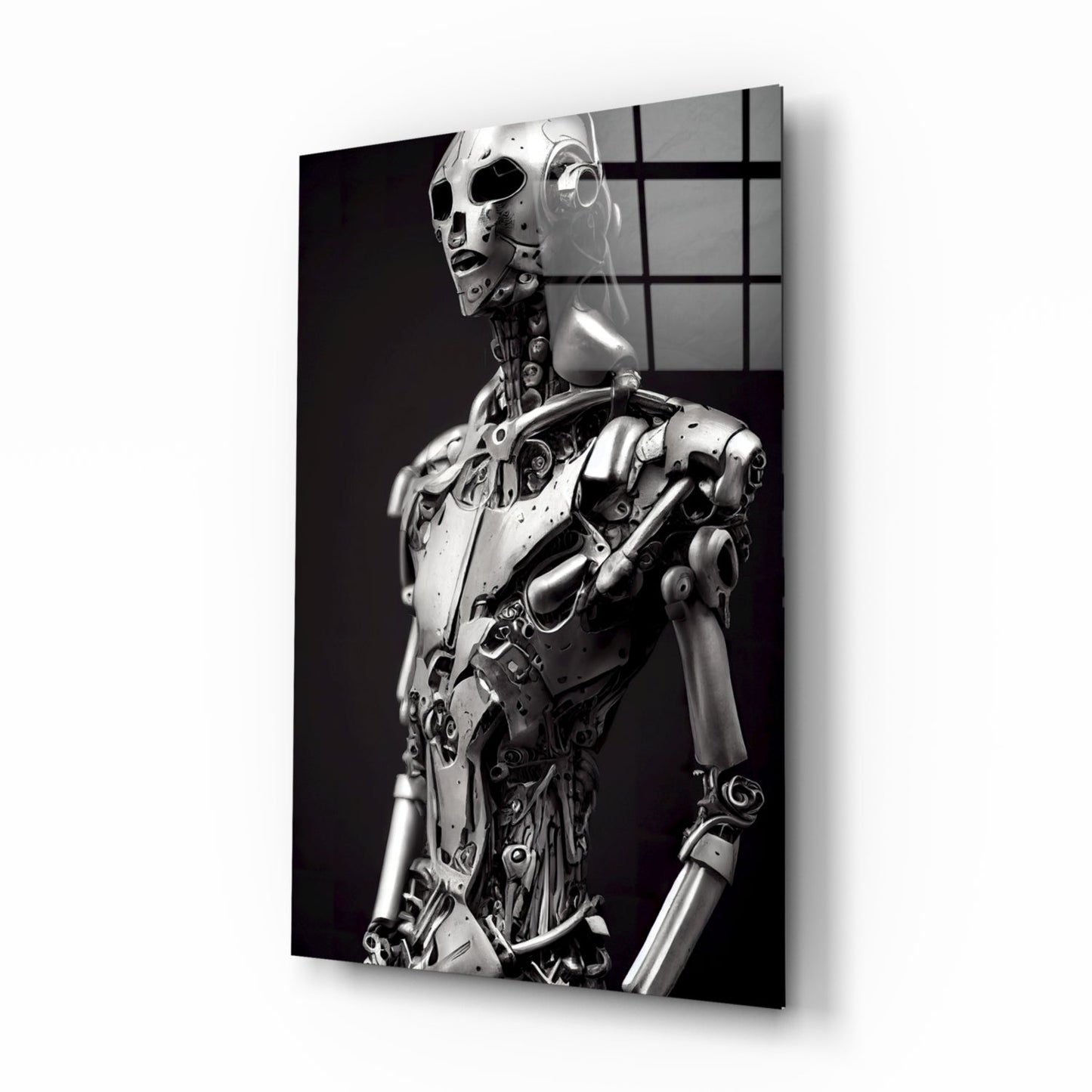 Monochromatic glass art panel displaying a metallic humanoid robot figure in profile against a dark background with gridded window reflections.