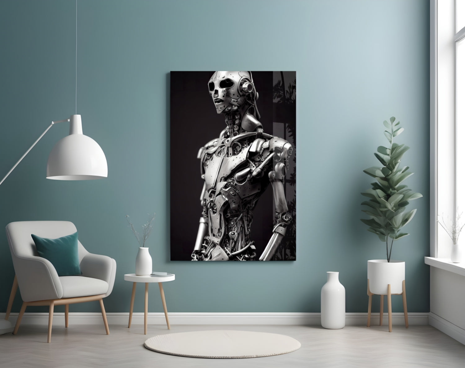 Monochromatic glass art depicting a humanoid robot figure with mechanical details displayed on a teal bedroom wall above a white armchair.
