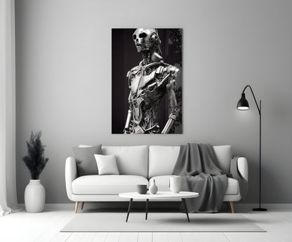 Monochromatic glass art depicting a humanoid robot figure with mechanical details displayed on a living room wall above a white sofa.