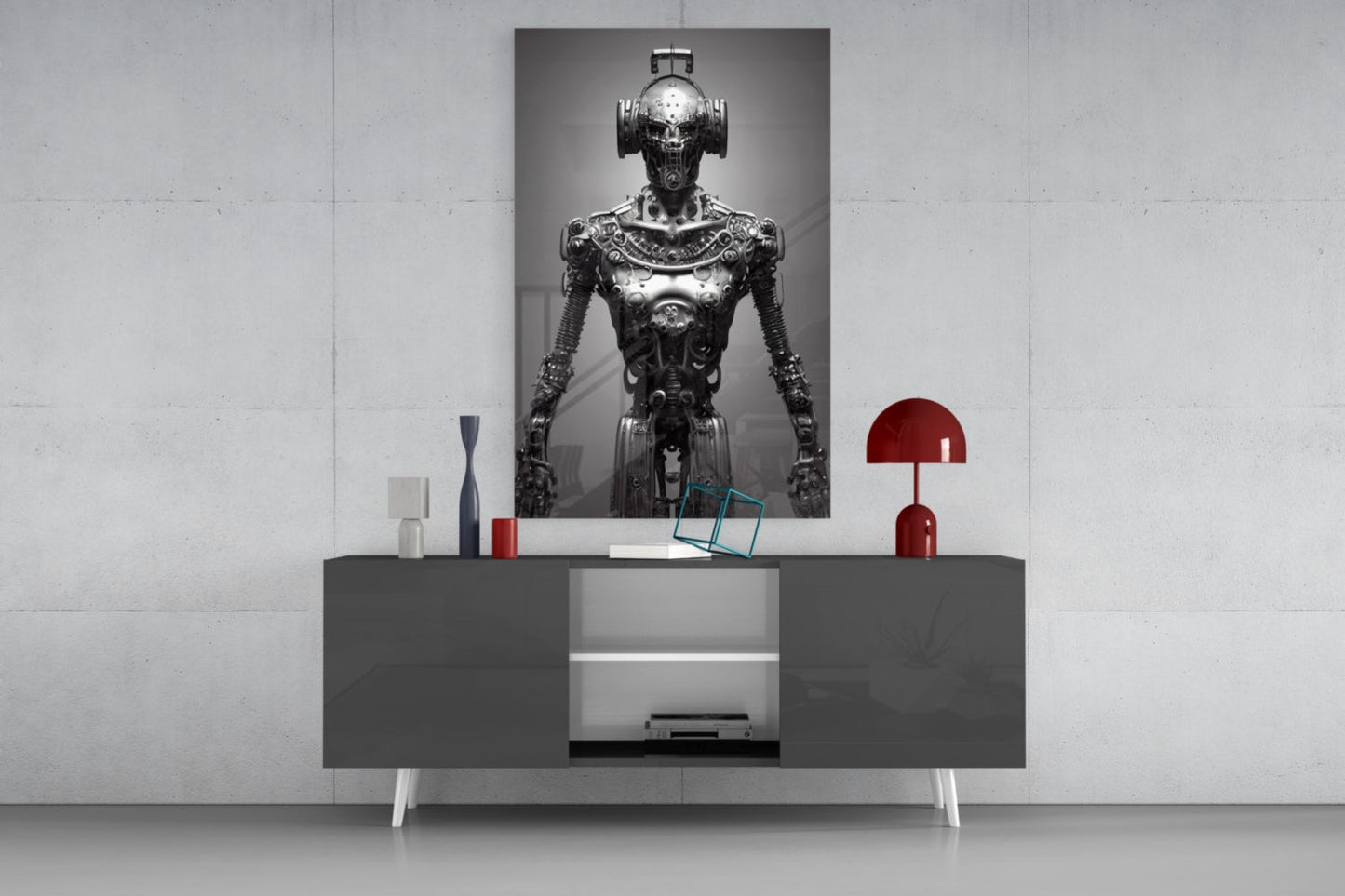 Turquoise glass cube sculpture displayed on gray console table beneath metallic robot portrait and red lamp.