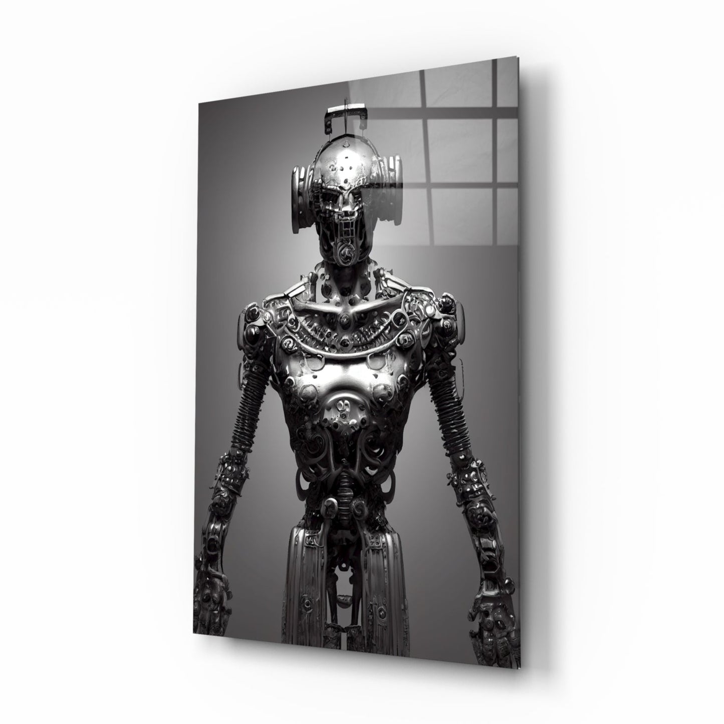 Black and white photograph of an ornate mechanical humanoid figure with elaborate metallic detailing, displayed on glass wall art with gridded window reflection.