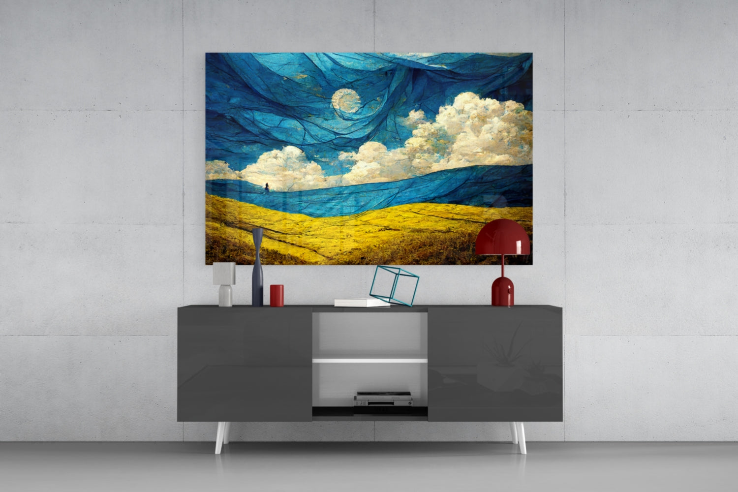 Dancing Sky Glass Art mounted above dark gray media console with white legs, displaying swirling blue sky, cream clouds, and golden wheat field landscape.