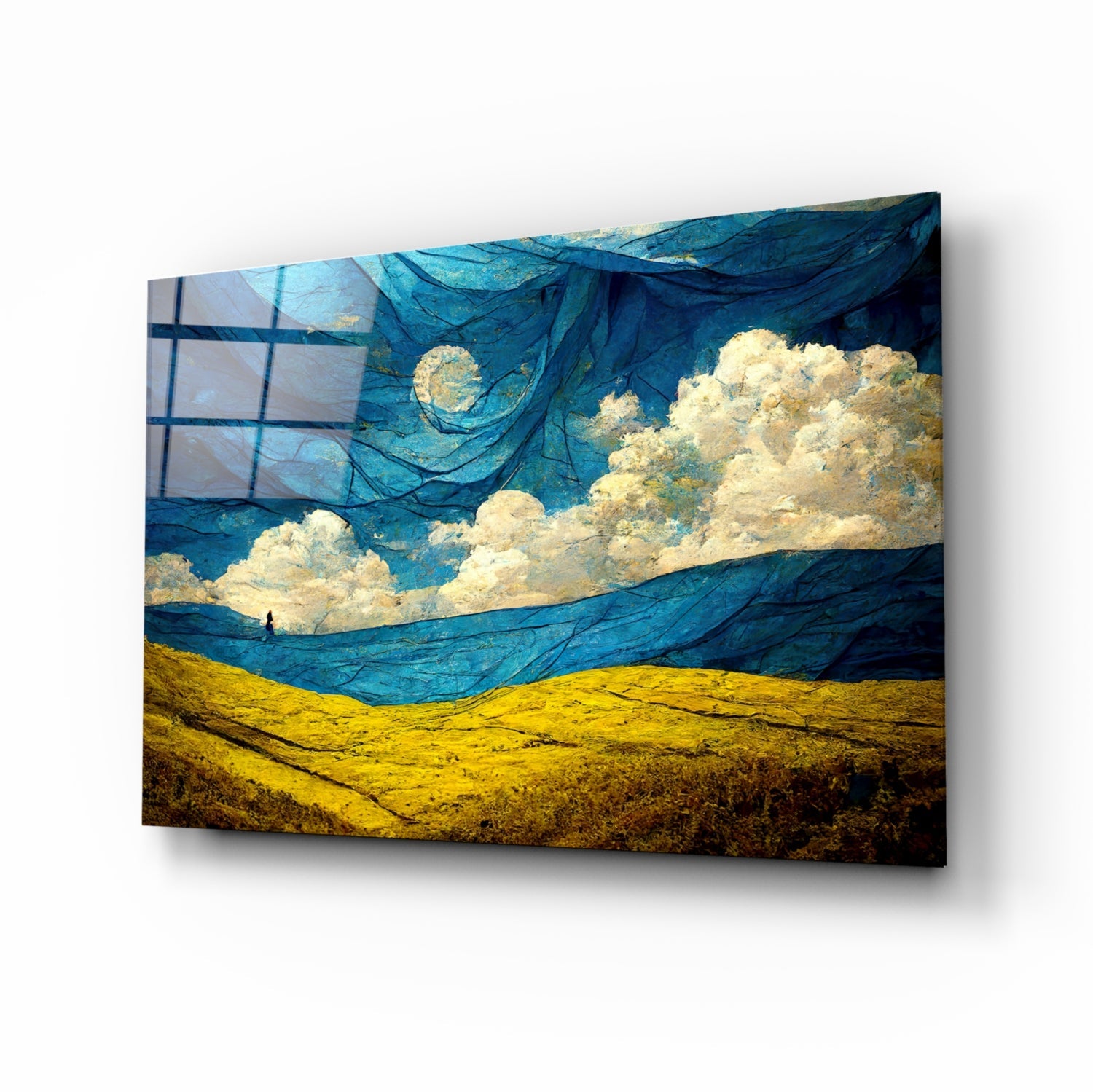 Glass art panel displayed at angle showing blue sky with white clouds, golden wheat field, and flowing blue fabric textures with moon and small figure silhouette.