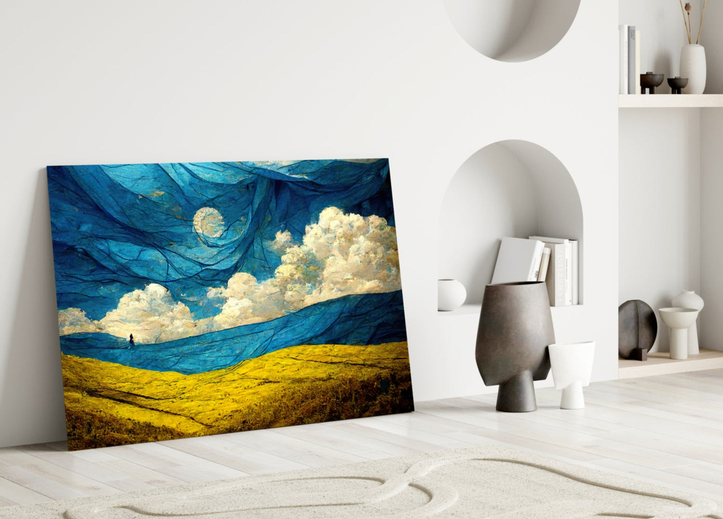 Dancing Sky Glass Art leaning against white wall in minimalist room with blue and yellow landscape design.
