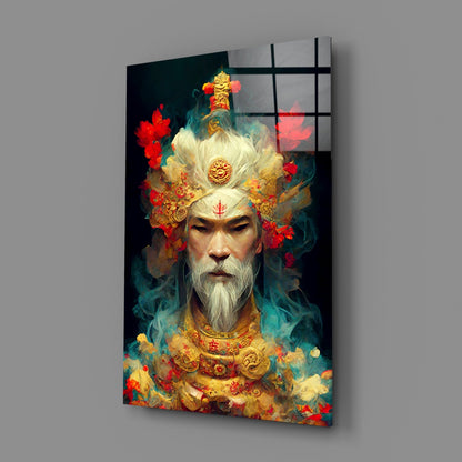 Angled view of glass art panel displaying bearded figure in white hair and golden ornamental headdress surrounded by red flowers and teal smoke effects against dark background.