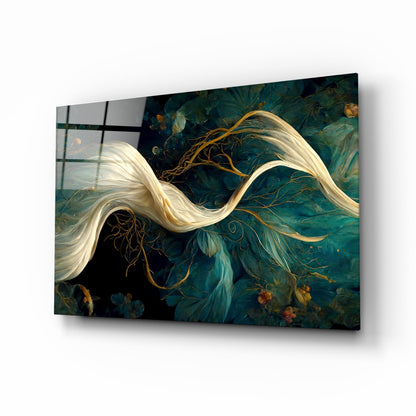 Angled view of glass art panel displaying cream-colored flowing ribbons against deep teal background with golden branches and botanical details.