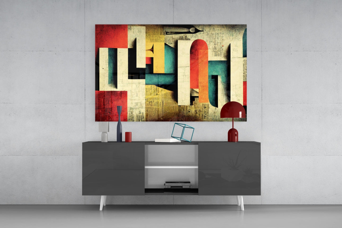 Colorful abstract geometric glass art panel mounted above dark media console, featuring red, teal, yellow, and cream shapes with vintage texture.