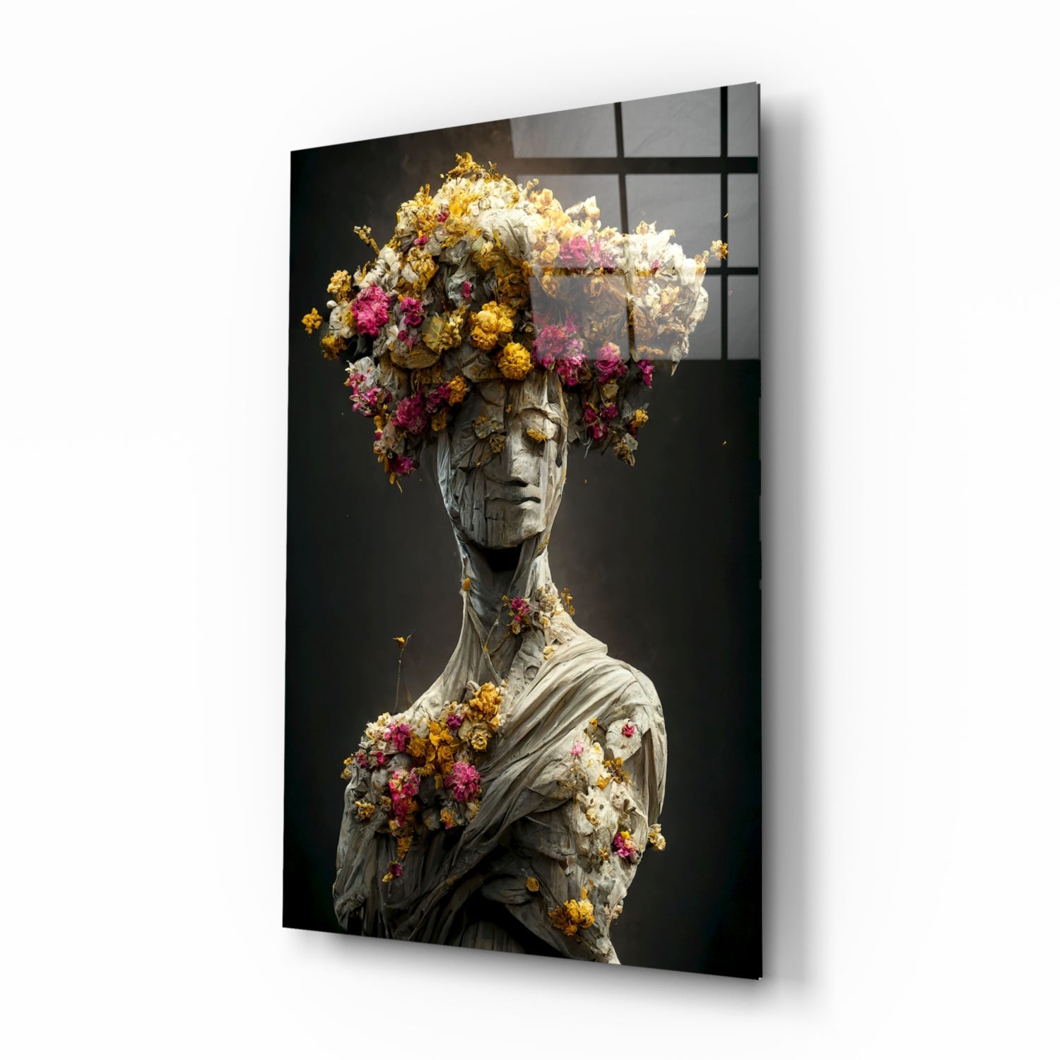 Stone bust adorned with vibrant dried flowers in pink, yellow, and white against dark background on glass panel.