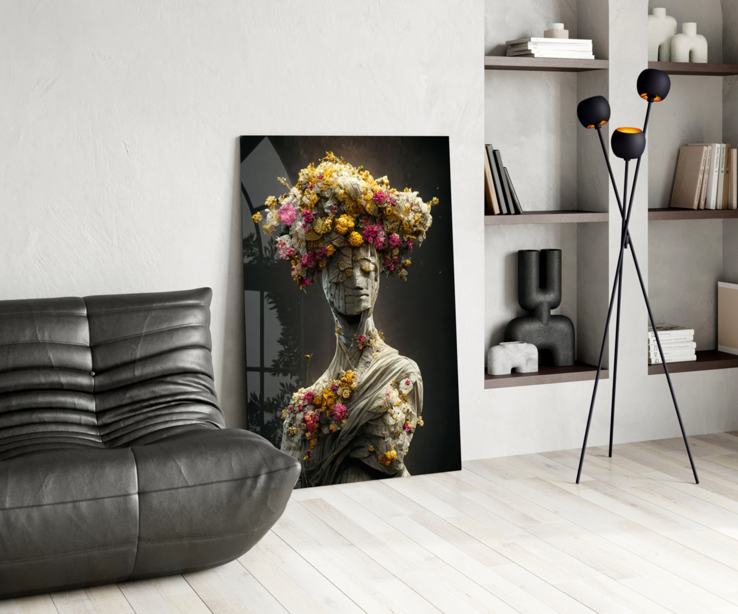 Glass art panel featuring classical statue bust with vibrant yellow, pink, and gold flowers blooming from head and torso against dark background, displayed in modern living room setting.