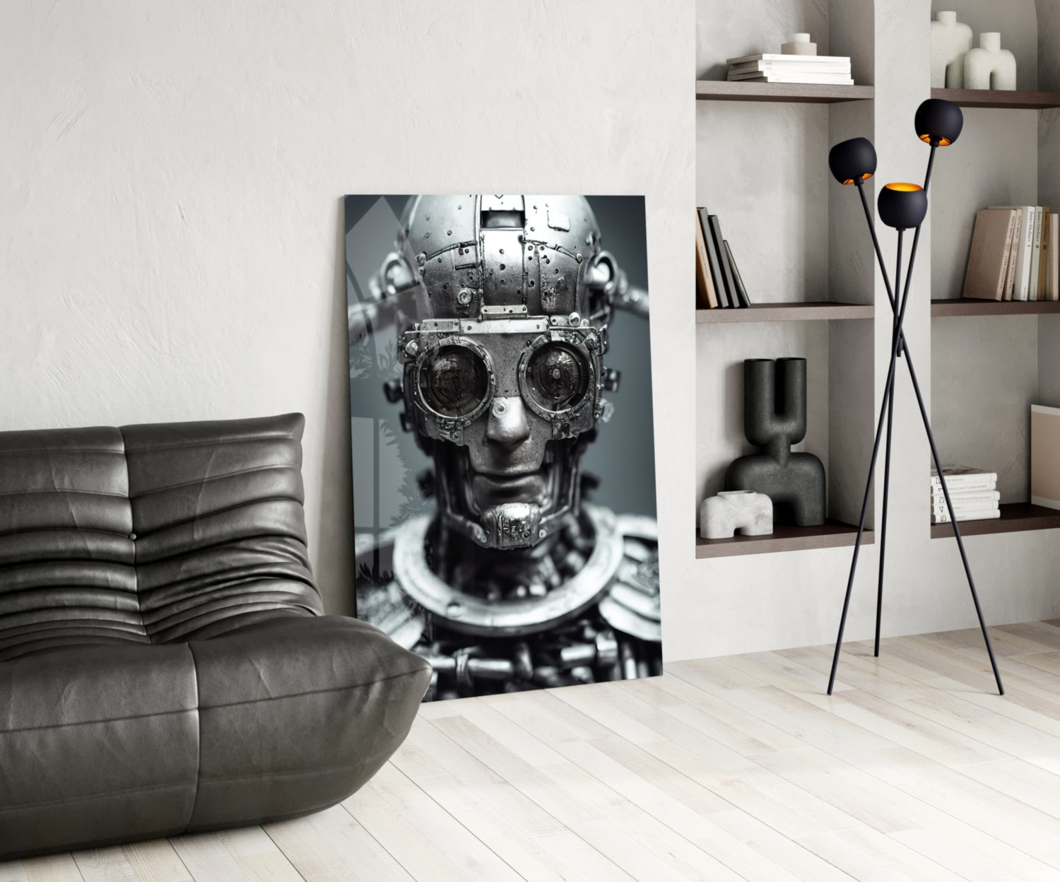 Modern living room interior displaying a black and white mechanical skull artwork on glass leaning against white wall.