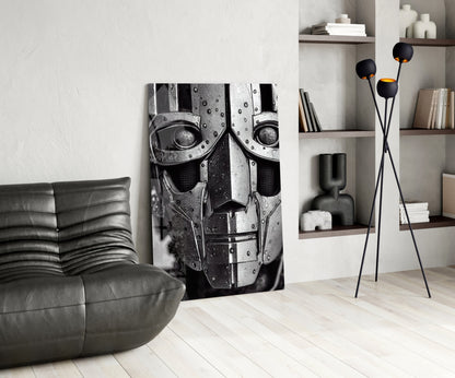 Modern living room interior featuring a black leather curved sofa, monochromatic robotic face canvas artwork, tall black floor lamp with spherical gold-lined shades, and wooden wall shelving with books and décor.