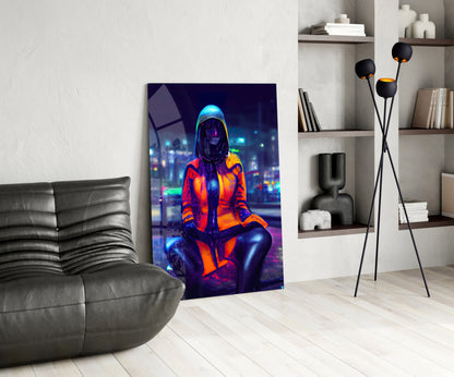 Neon-lit futuristic figure in red and orange jacket displayed as glass wall art in modern living room with gray sofa and shelving.