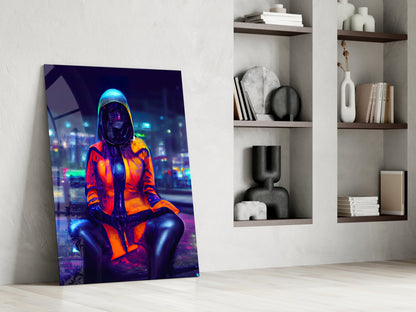 Neon-lit cyberpunk figure in red and orange jacket displayed as glass wall art leaning against white wall beside shelving.