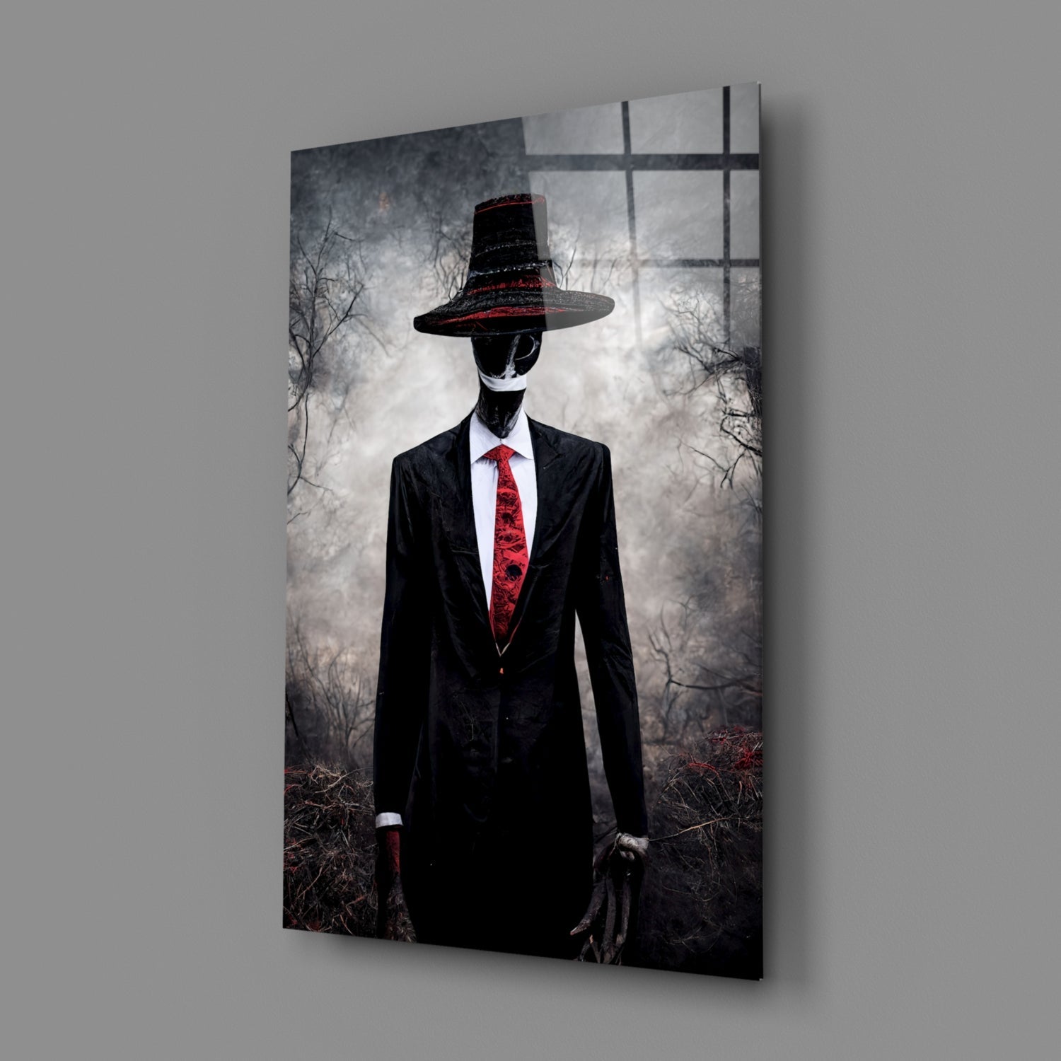 Angled view of glass art panel featuring silhouetted figure in black suit and red tie wearing wide-brimmed hat against bare tree background.