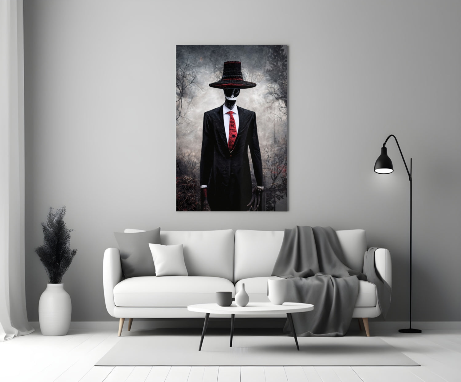 Glass art print featuring a figure in black suit and wide-brimmed hat with red tie against moody forest background, displayed above white sofa.