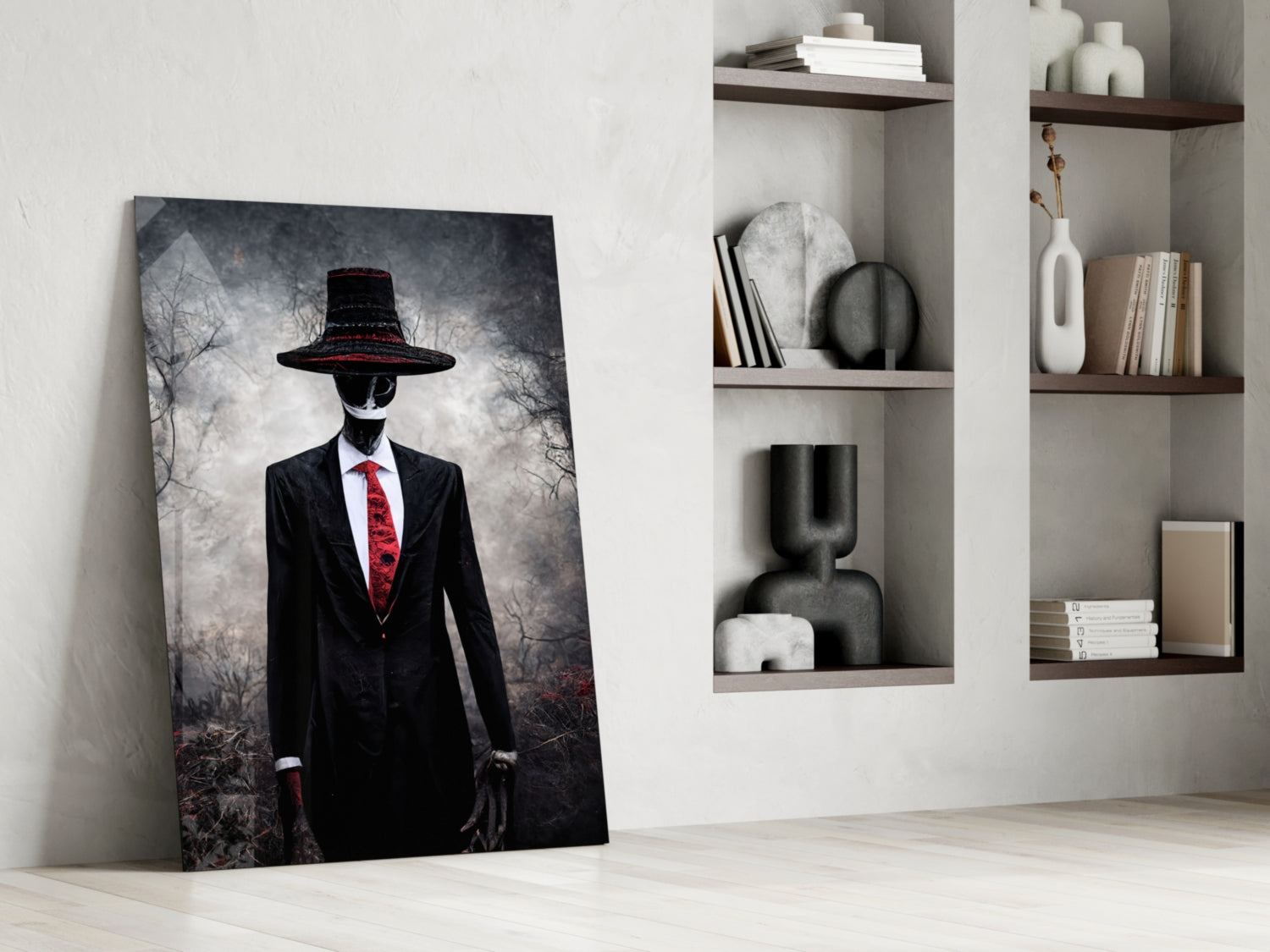 Leaning canvas artwork depicting a figure in black suit and red tie wearing a wide-brimmed hat against a moody forest background, displayed in minimalist room setting.