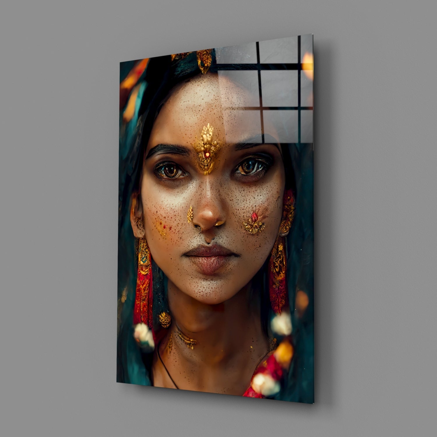 Portrait of woman with gold facial jewelry and freckles printed on glass panel with black grid overlay, angled three-quarter view.