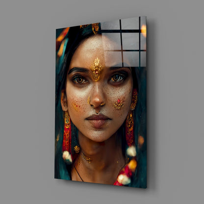 Portrait of woman with gold facial jewelry and freckles printed on glass panel with black grid overlay, angled three-quarter view.