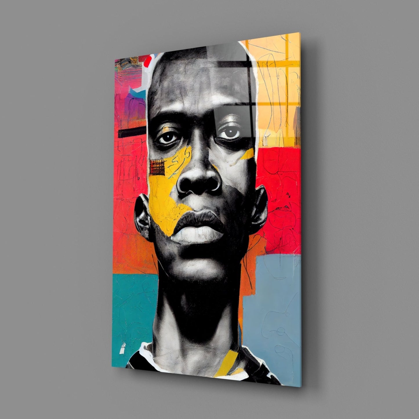 Canvas wall art featuring a stylized black and white portrait head with colorful geometric blocks in red, yellow, teal, and blue overlaid on the background.