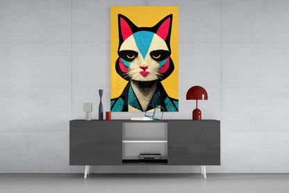 Colorful pop art cat portrait with geometric blue, pink, and cream face on yellow background displayed above modern gray console table.