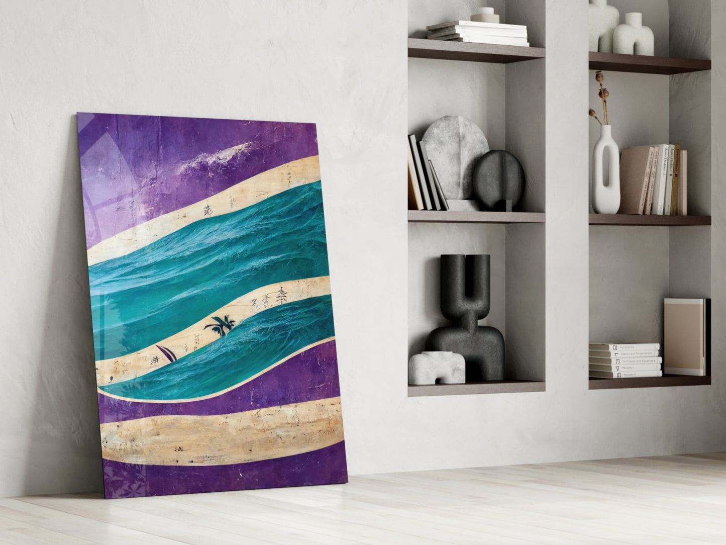 Angled view of purple, turquoise, and cream striped glass wall art leaning against white wall beside built-in shelving with decorative objects.