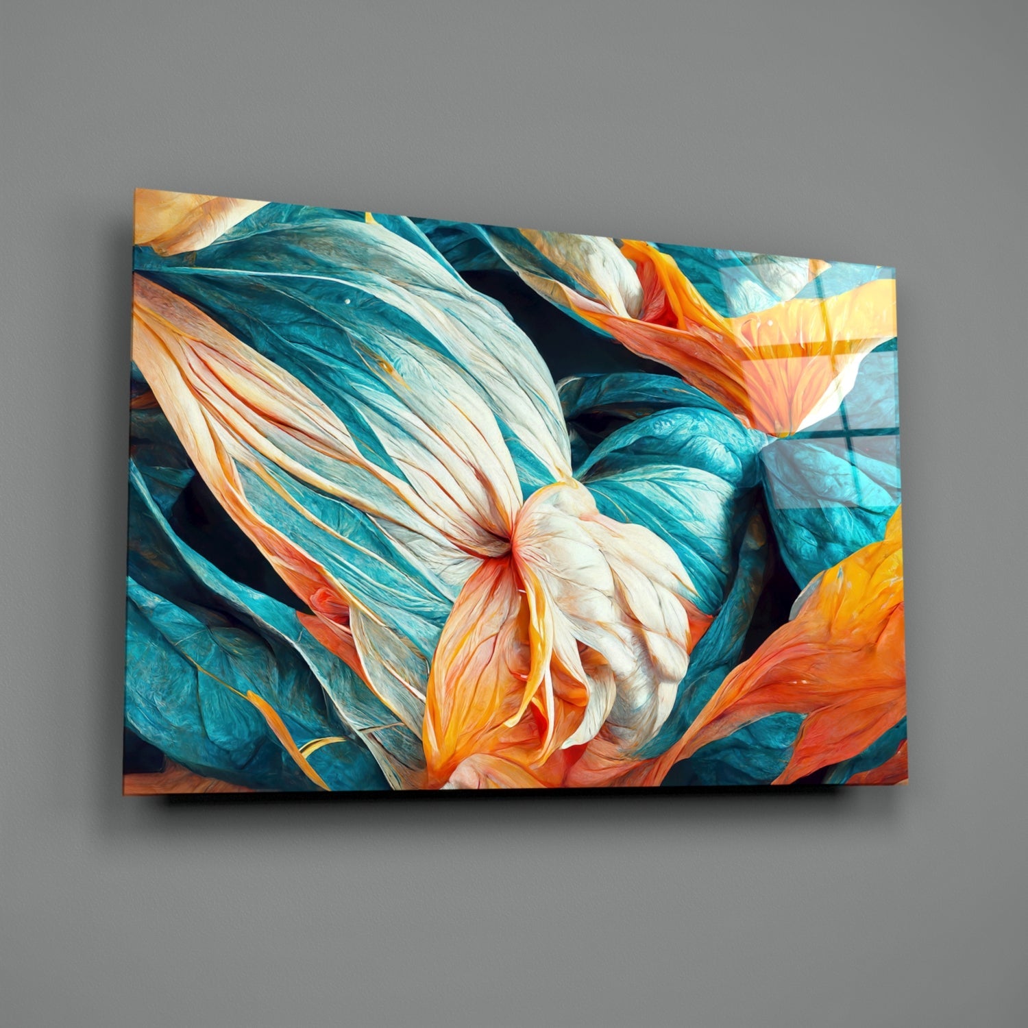 Glass wall art displaying vibrant teal, orange, and cream abstract floral design mounted on gray wall.