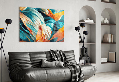 Colorful glass wall art featuring teal, orange, and cream butterflies and flowers displayed above a black leather sofa in a modern living room interior.