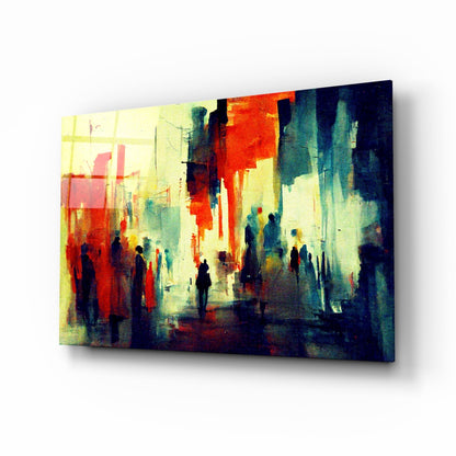 Glass wall art depicting silhouetted figures in an urban street scene with warm yellow, red, and cool blue tones.