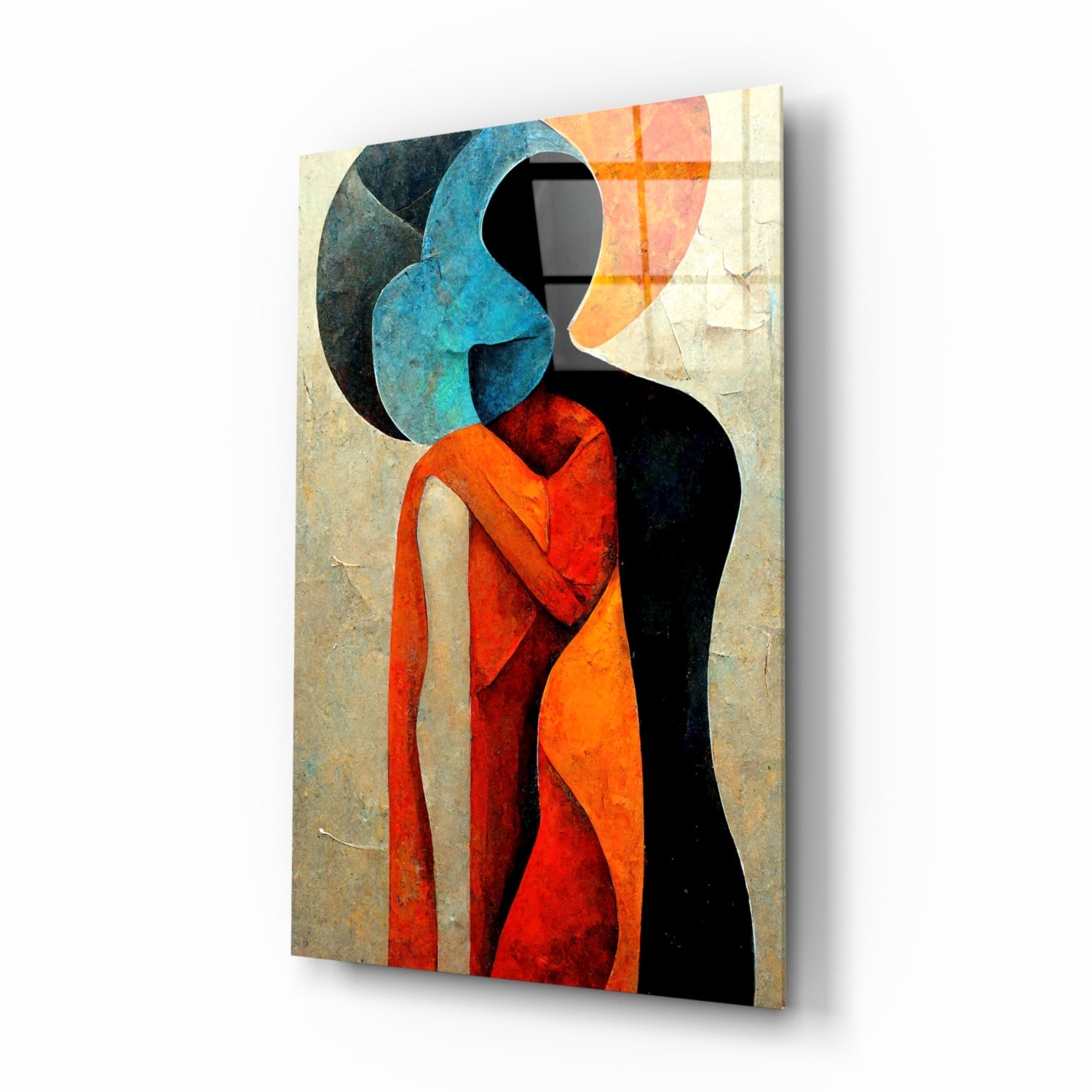 Abstract glass wall art depicting two stylized figures embracing, featuring blue, red, orange, and black geometric shapes on a textured cream background.