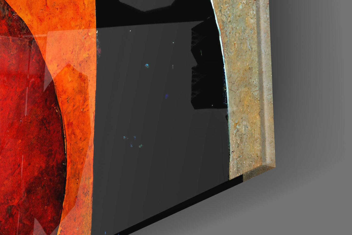 Close-up angled view of Hug Glass Wall Art showing red-orange curved glass panel, dark interior space, and textured wooden frame edge.