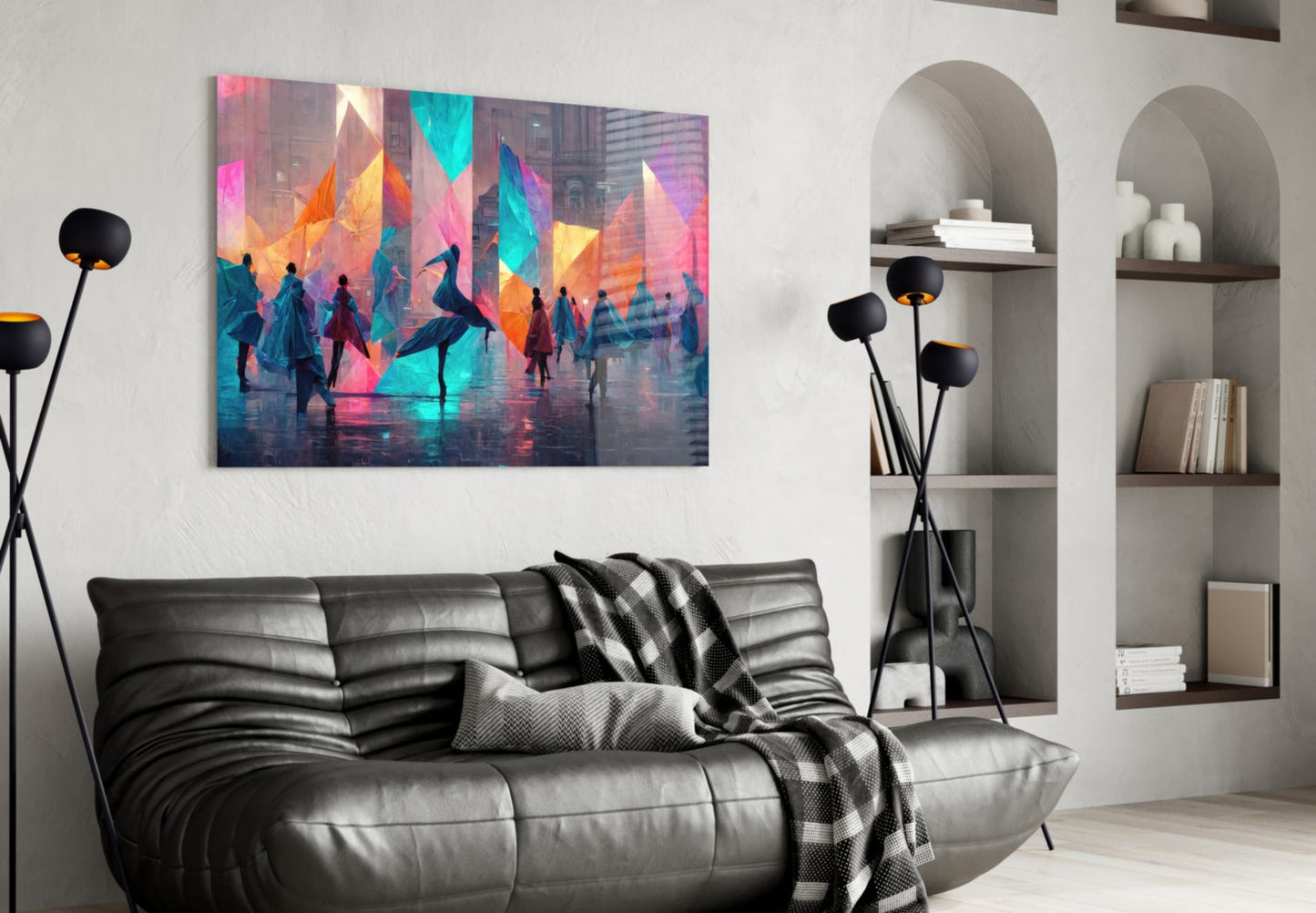 Colorful glass wall art depicting silhouetted figures beneath geometric pink, orange, and blue shapes displayed above black leather sofa in modern living room.