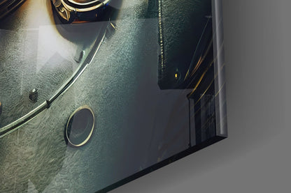 Robotic View Glass Wall Art mounted on textured teal wall with brass-rimmed circular mirror detail, photographed at angle showing installation.