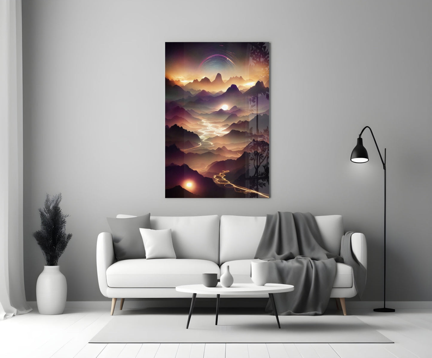 Lava Glass Wall Art hanging above white sofa in modern living room, depicting golden-hour mountain landscape with glowing valley and purple sky.