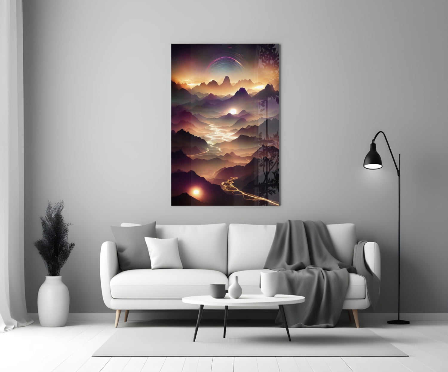 Lava Glass Wall Art hanging above white sofa in modern living room, depicting golden-hour mountain landscape with glowing valley and purple sky.