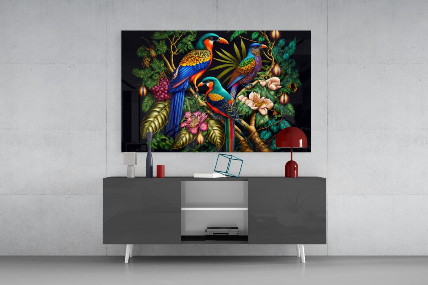 Tropical Birds Glass Wall Art displaying three colorful parrots among foliage mounted above gray media console in modern living room setting.