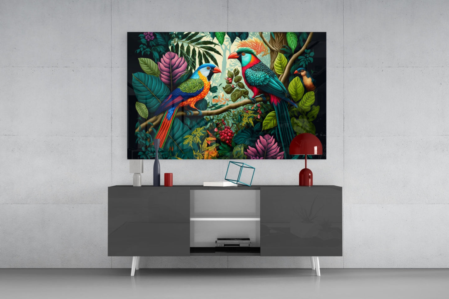 Colorful tropical parrot glass wall art displaying two macaws among lush foliage mounted above a modern gray media console.